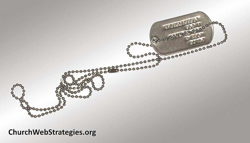 military dog tags on table