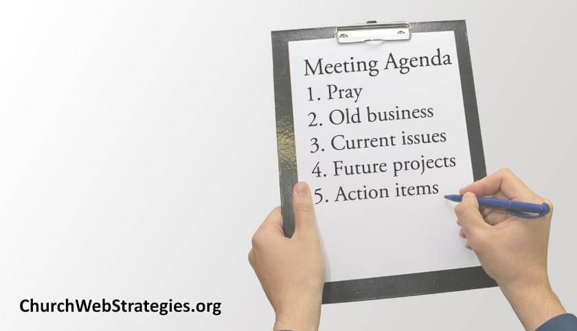 Clipboard with meeting agenda items