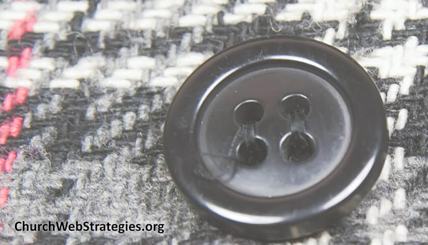 close-up of button on a jacket
