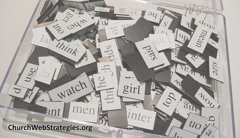 bin of magnets with words on them